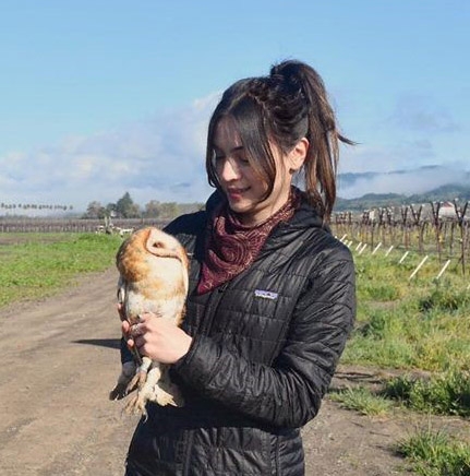 Ashley Hansen holding an owl